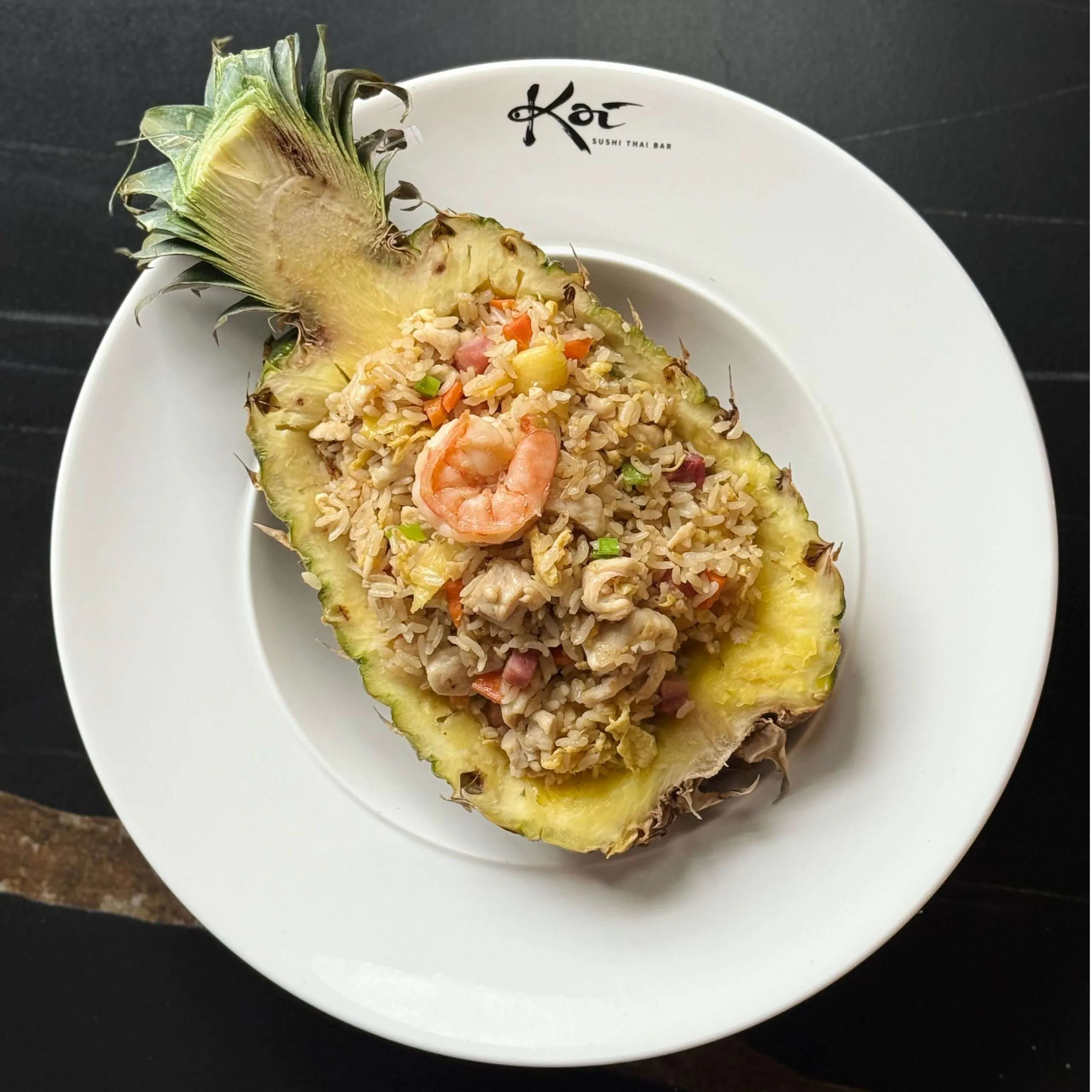 Fried rice with shrimp, vegetables, and chicken